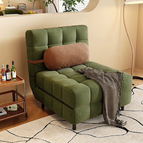 Olive green corduroy mendez single sofa bed with brown cylindrical pillow and striped throw blanket draped on seat