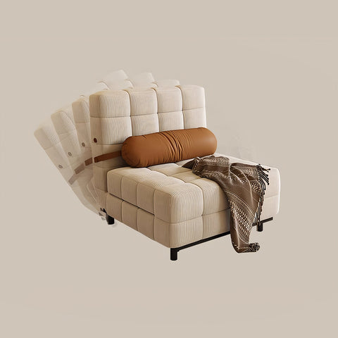 Cream-colored corduroy Mendez two seater sofa bed with tufted design, brown pillow, and patterned throw blanket