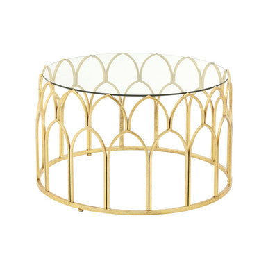 Merlin gold leaf coffee table with gold-toned metal frame and clear glass top featuring an arched cage-like design