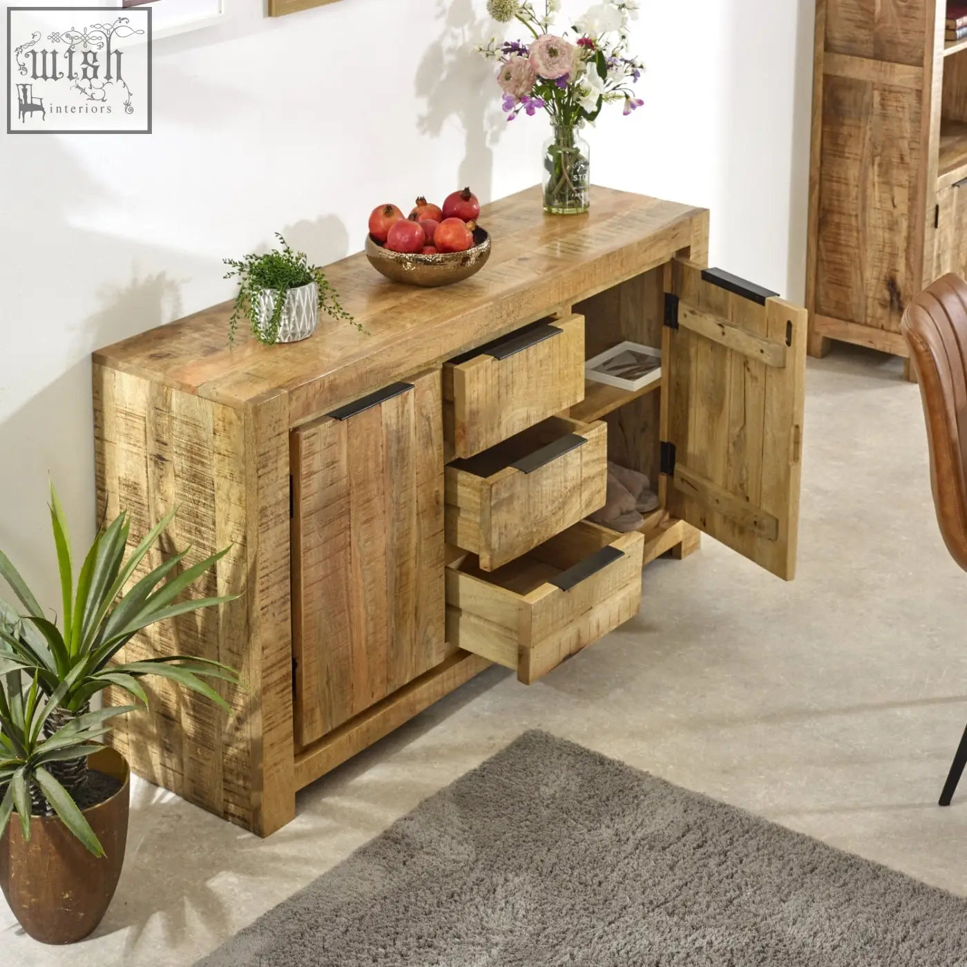 Merlin large sideboard made of reclaimed solid wood with rustic finish featuring two doors and three drawers with black handles