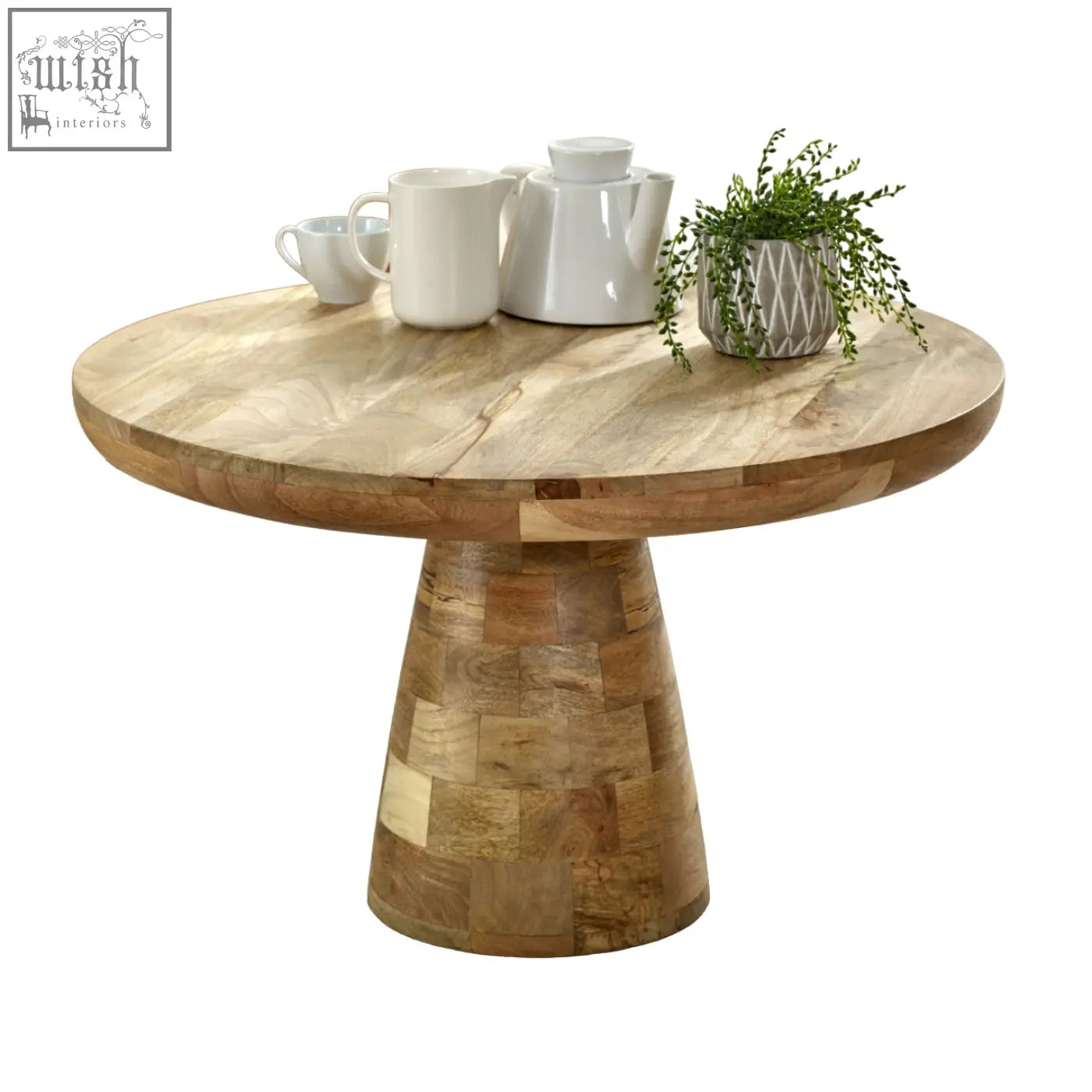 Merlin mango wooden round coffee table with natural finish and patchwork pedestal base in mushroom style