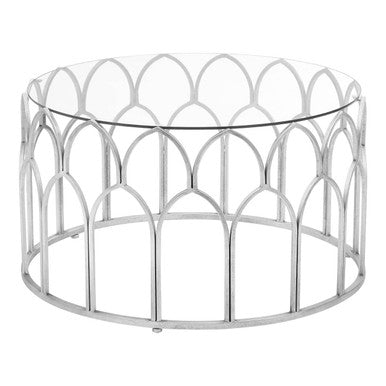 Circular merlin silver leaf coffee table with clear glass top and ornate silver leaf metal frame with arched patterns