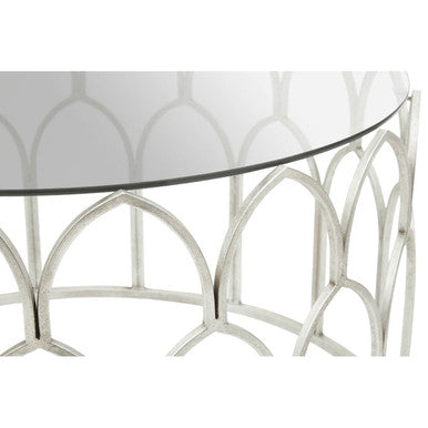 Merlin silver leaf coffee table with a silver metallic arched base and clear glass top perfect for stylish living rooms