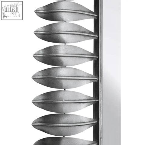 Silver metallic leaf frame wall mirror with sleek modern design perfect as a silver leaf frame decor piece