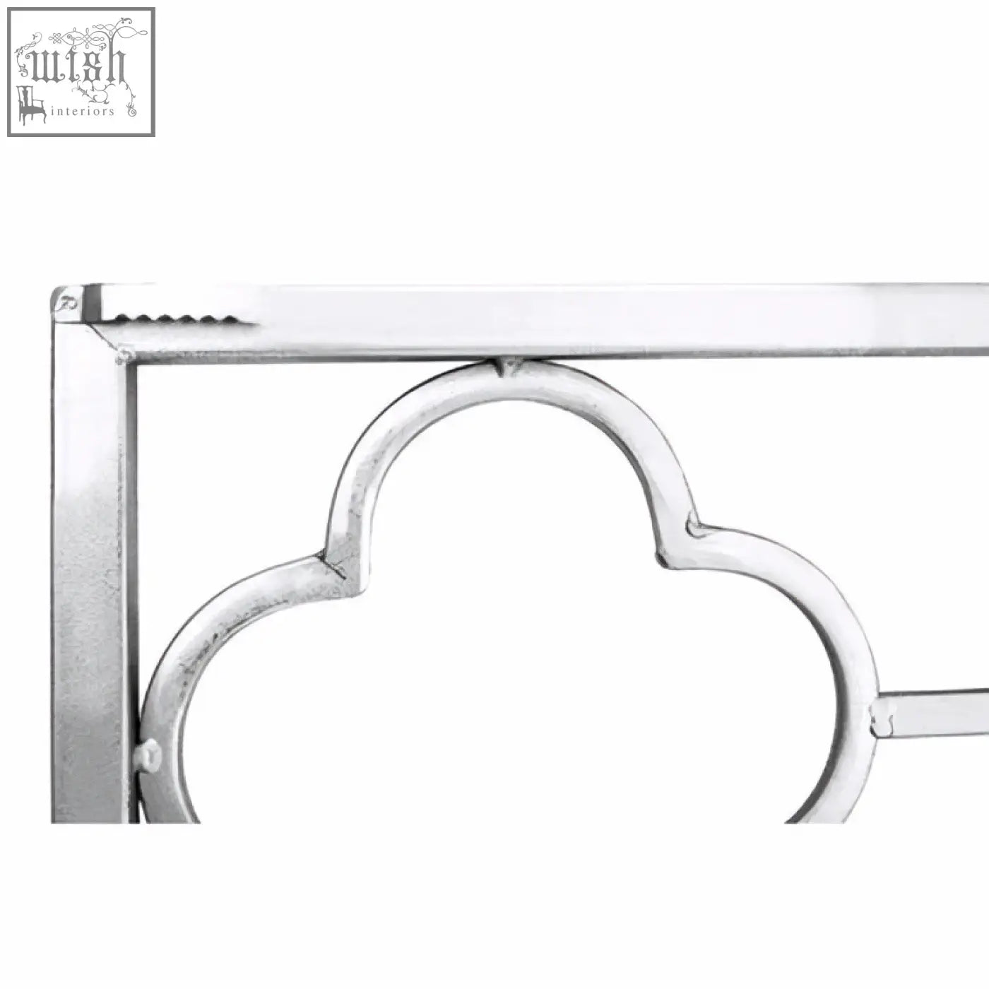Silver metal bed frame with ornate arched design complements merlin silver leaf wall mirror style and decor