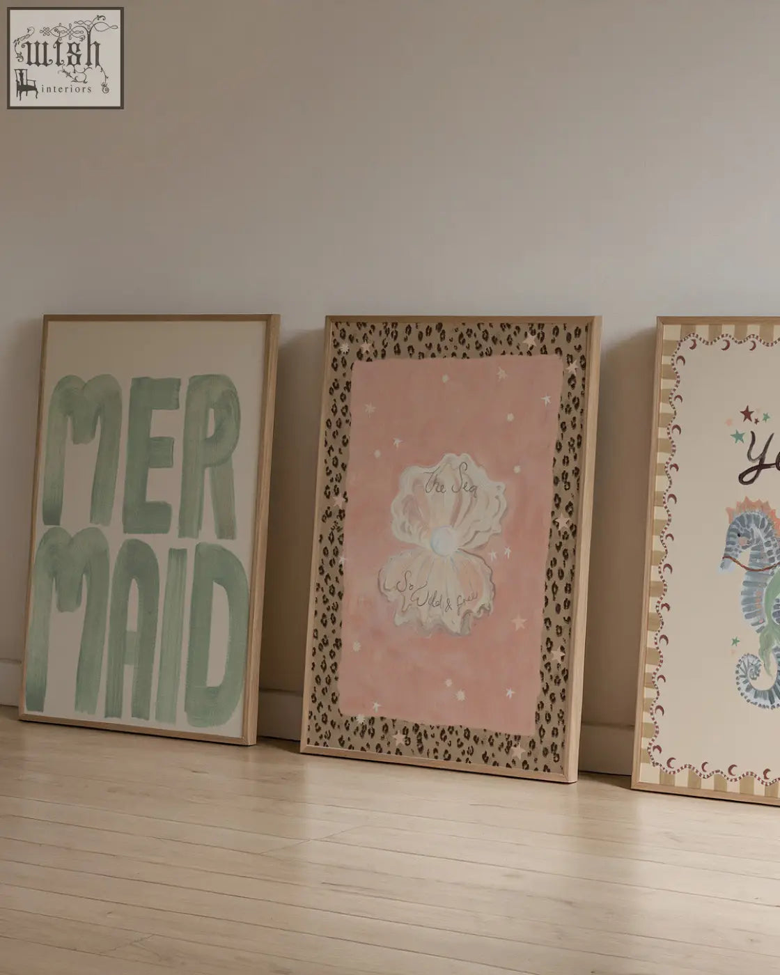 Three framed acrylic paint wall art pieces with mermaid word text, pink seashell, and sea horse from sea collection