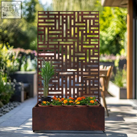 Rustic brown metal indoor outdoor privacy screen with geometric cutout pattern and planter box at base 90cm x 180cm