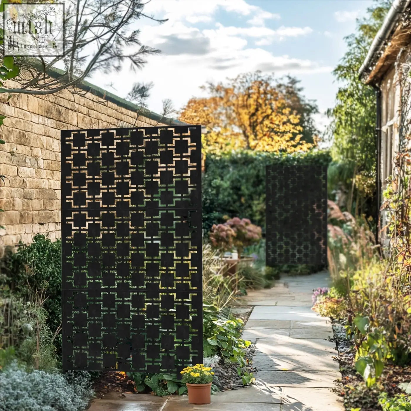 Black metal indoor outdoor privacy screen with geometric cut-out pattern and stand 120cm x 180cm squares