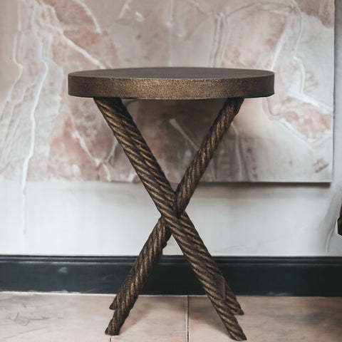 Bronze finished metallic rope side table with crossed legs and mango wood circular top for stylish accent use