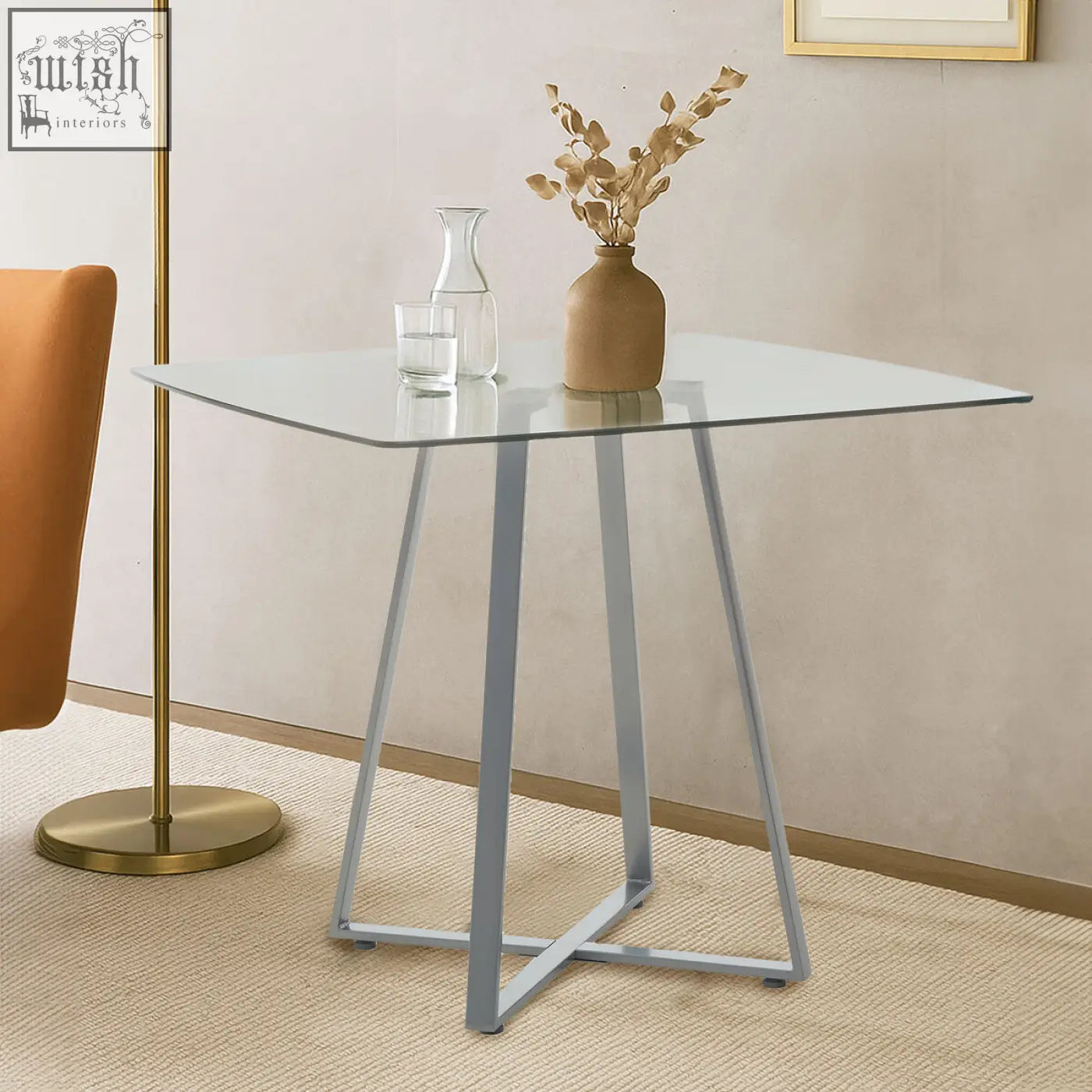 Modern glass-top metropolitan square matte grey dining table with sleek silver metal legs and square matte grey finish