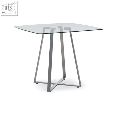 Modern square matte grey dining table with glass top and sleek chrome metal legs metropolitan square matte design