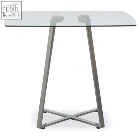 Modern rectangular metropolitan square matte grey dining table with glass top and sleek silver x-shaped metal legs