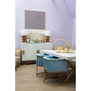 Light blue velvet chair with gold metal frame and soft upholstery perfect as a blue velvet dining chair