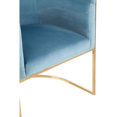 A sleek mias blue velvet chair featuring a light blue velvet chair with a modern gold-toned metal frame