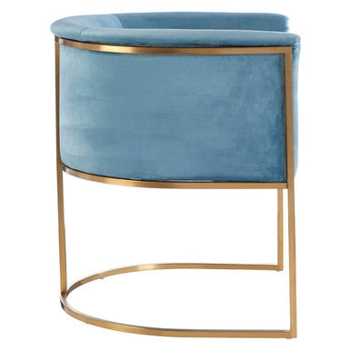 Mias blue velvet chair with a sleek curved gold frame and plush light blue velvet upholstery for stylish seating