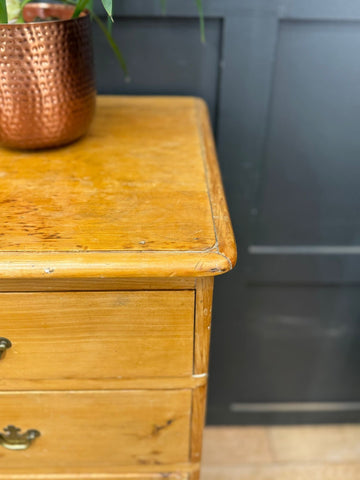 Mid victorian rustic pine chest of drawers with rounded corners and warm amber finish for farmhouse bedroom storage