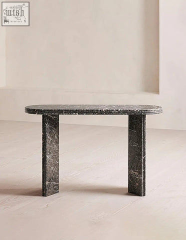 Elegant midnight luxe console table with black console table style and natural marble surface in oval shape