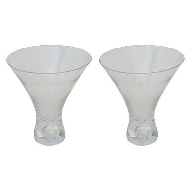 Two clear glass cocktail glasses with fluted rims and decorative bases in the mila set of 2 clear cocktail glasses 330ml