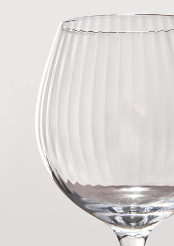 Clear glass Mila set gin glasses with slender stem and vertical fluted texture perfect for serving gin