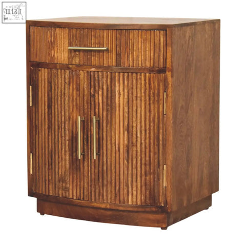 Milan fluted bedside cabinet in rustic wood with vertical slats and brass handles for stylish bedroom storage