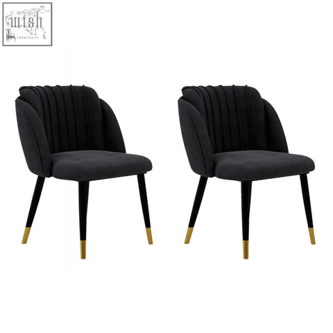 Black velvet milano velvet dining chair with ribbed back and gold tipped legs perfect as a stylish dining chair
