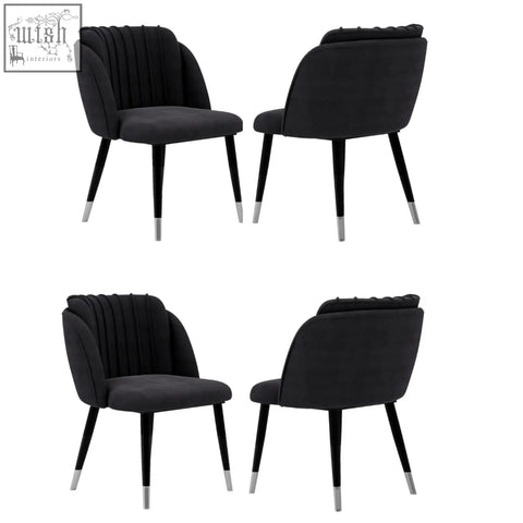Black velvet milano velvet dining chair with tufted backrest and silver capped tapered legs perfect for dining room