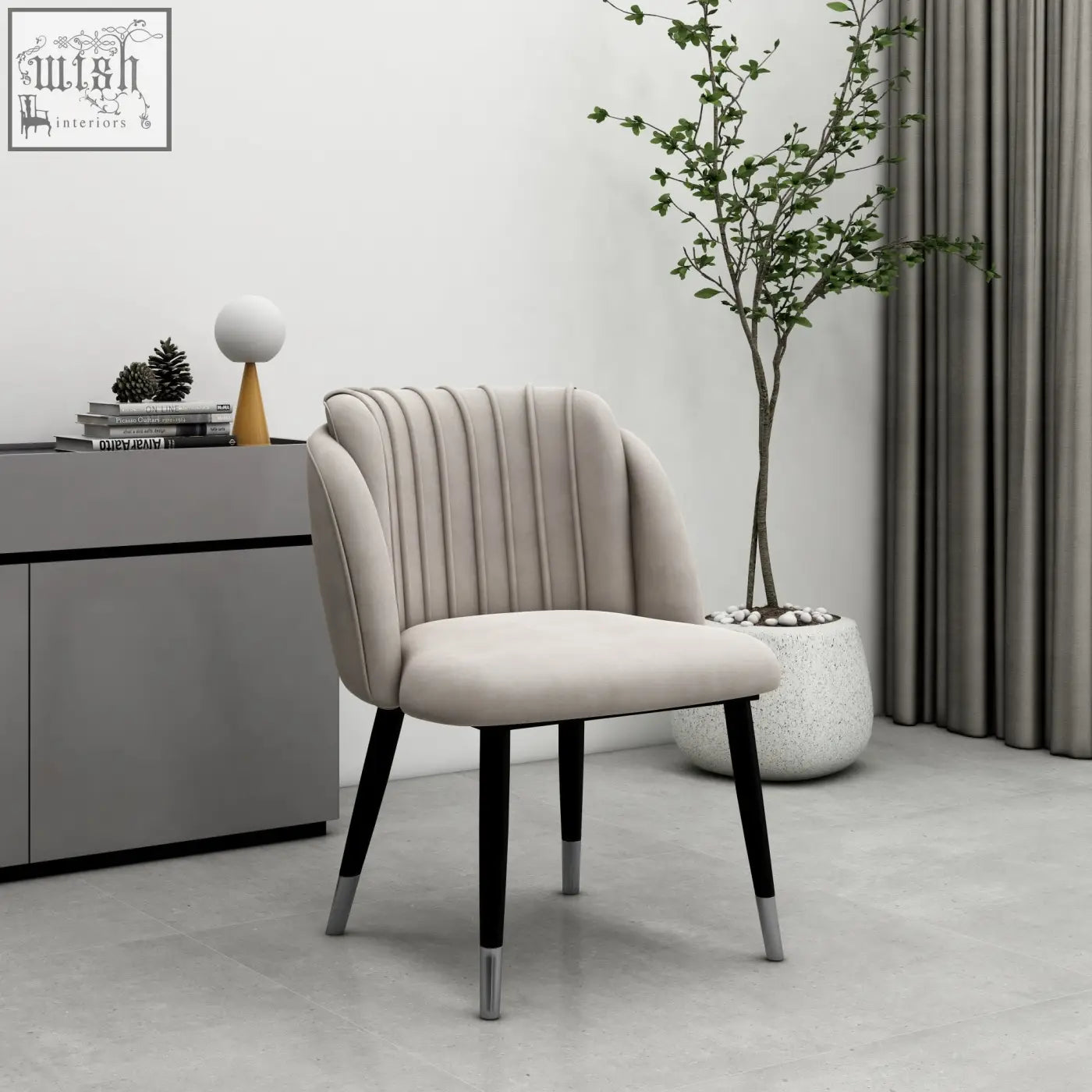 Beige milano velvet dining chair with vertical pleats and black legs capped in silver for stylish dining seating