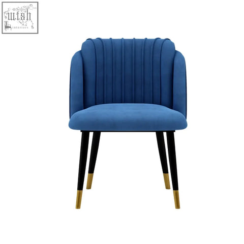 Blue velvet milano velvet dining chair with vertical pleats and black legs capped in gold perfect as a velvet dining chair