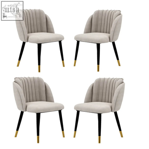 Beige milano velvet dining chair with black legs and gold-tipped feet modern velvet dining chair