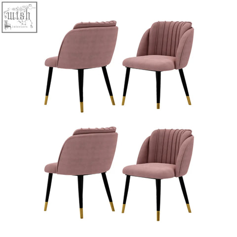 Pink velvet milano velvet dining chair with black legs and gold-tipped feet perfect as a stylish dining chair