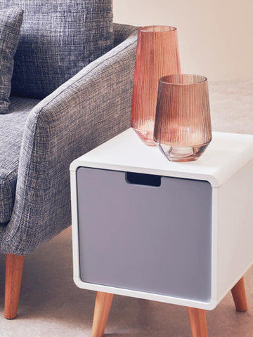 White and gray milo 1 door cabinet with natural legs and light two-tone finish as a modern door cabinet