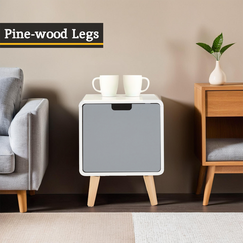 White door cabinet with gray front panel and natural pine wood legs in a light two tone finish perfect for storage