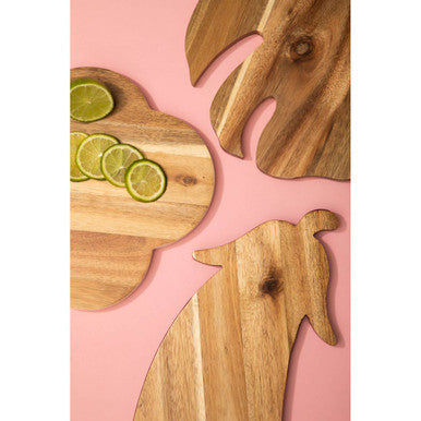 Wooden dog-shaped cutting board with natural grain and light brown finish from mimo aubergine design chopping series
