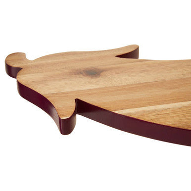 Wooden cutting board shaped like a pig with aubergine design chopping style in light brown wood and dark edges