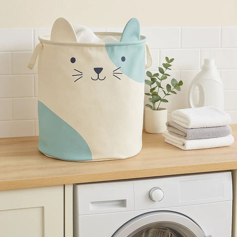 Cute mimo cat face laundry bag with cream and light blue fabric and embroidered cat face laundry design