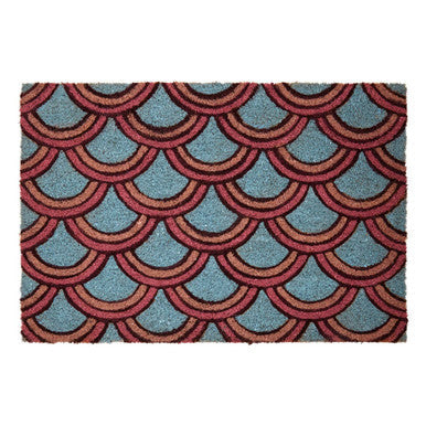 A mimo deco doormat with a red and blue overlapping fish scale pattern perfect for stylish entryways