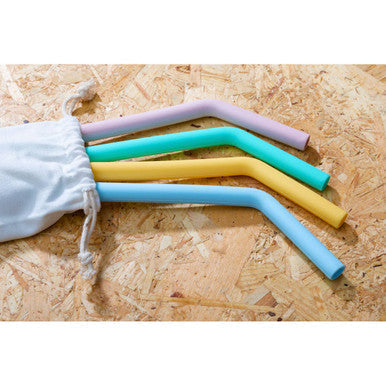 A mimo set of 4 colorful flexible silicone straws in pastel shades with bendable comfort and white storage bag