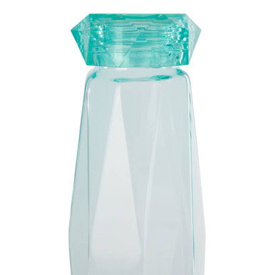 A translucent teal glass mimo teal drinking bottle with a faceted diamond-shaped cap perfect for water bottle use