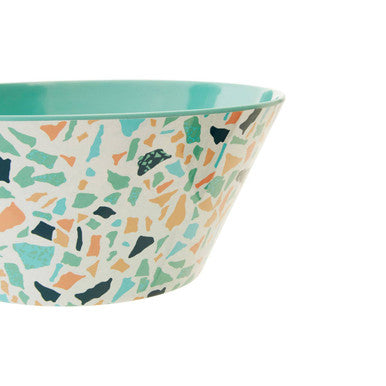 A white mimo terrazzo salad bowl with teal orange and black specks perfect for serving salads