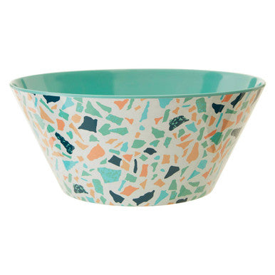A mimo terrazzo salad bowl with a white terrazzo pattern and solid turquoise interior perfect for serving salads