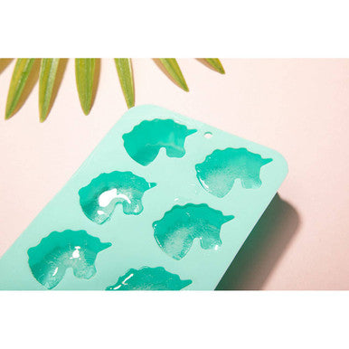 Mint green silicone ice cube tray with six unicorn ice cube molds by mimo for magical unicorn ice creations