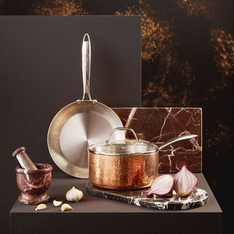 Hammered copper finish large saucepan with glass lid and stainless steel handle from minerva copper finish series