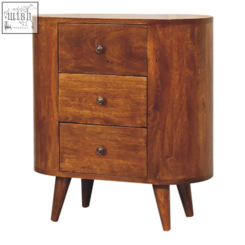 Mini chestnut chest of drawers with ample storage made from sleek curved mango wood and tapered legs