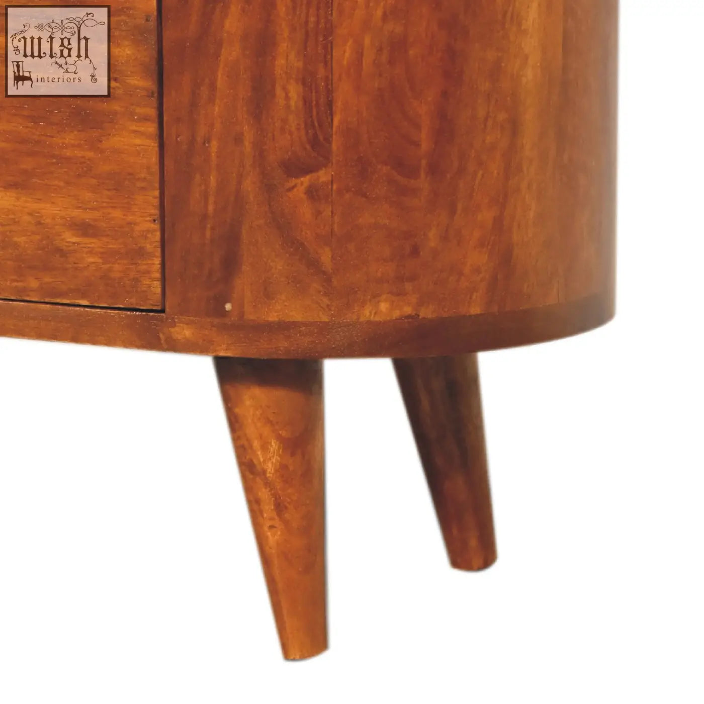 Mini chestnut chest of drawers in warm mango wood with curved design and tapered legs offering ample storage