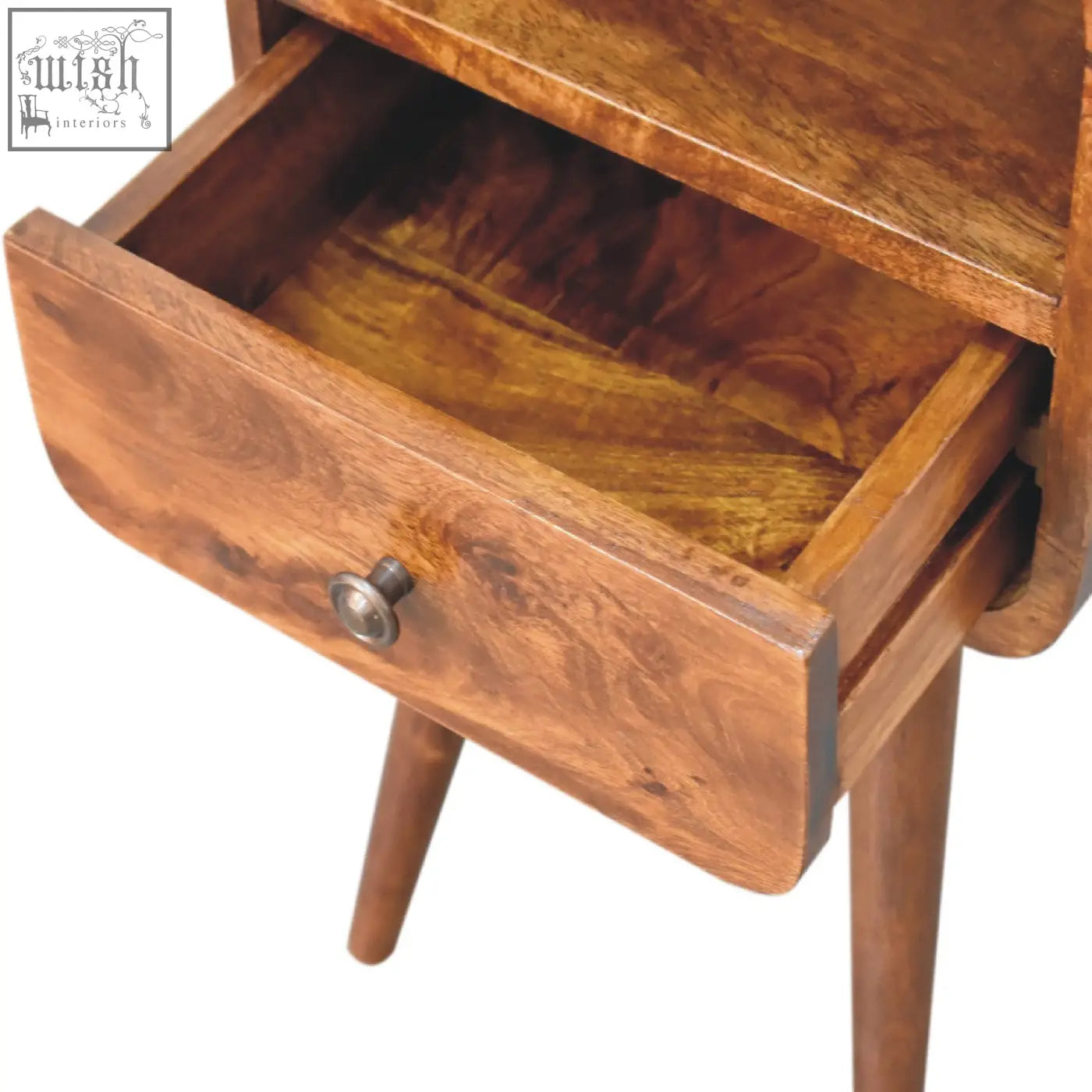 Warm-toned wooden mini chestnut curve bedside table with single drawer and round metal knob on tapered legs