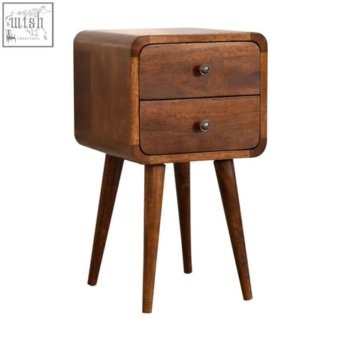 Mini chestnut curved bedside table in solid mango wood with two drawers and tapered legs in mid-century modern style