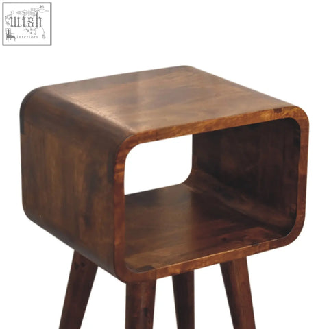 Mini chestnut curved dark brown wooden side table with sleek modern design and three angled legs for bedside use