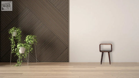 A minimalist wooden chair with rectangular seat and three slender legs next to a mini chestnut curved open bedside table