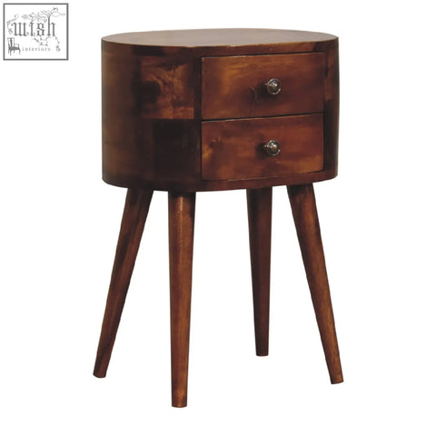 A sleek dark brown wooden mini chestnut rounded bedside table with two drawers and tapered legs for bedroom use