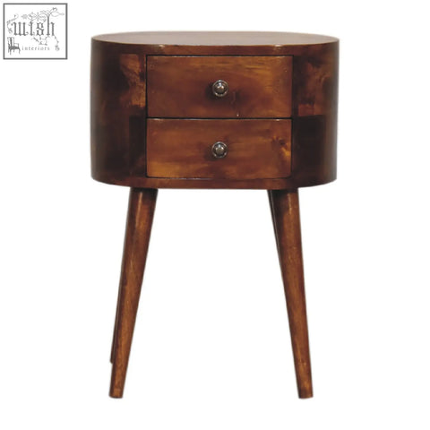 A sleek dark brown wooden mini chestnut rounded bedside table with two drawers and tapered legs